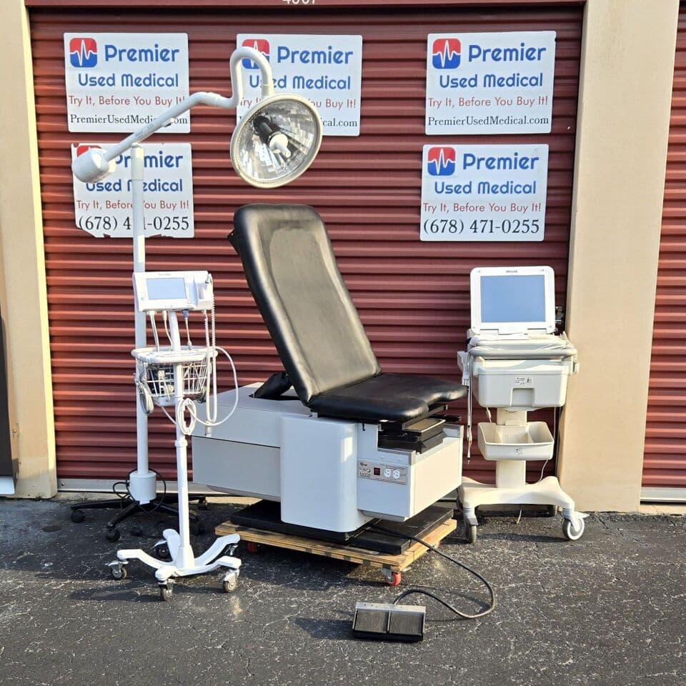 For Sale ENOCHS Power Exam Table 4000 w New Black Upholstery Lt or Tan Base Exam Table