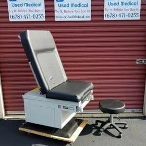 For Sale UMF Power Exam Table 5080 w New Black Upholstery (Power Up & down- manual back) Exam Table