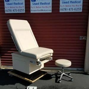 For Sale UMF Power Exam Table 5080 with New Creme Upholstery (Power Up & down- manual back) Exam Table