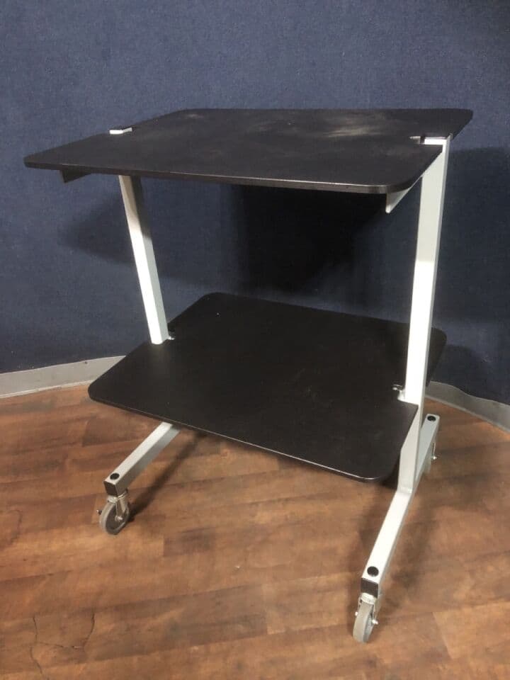 For Sale 2 Shelf Rolling Equipment Cart: Steel constructed with solid casters, two of them locking. Meant for heavy items.