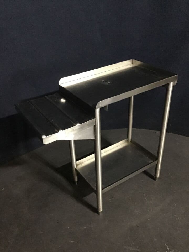 For Sale Stainless Dispenser Table: Food Services, Restaurant drain table Includes two drain holes near center of table. Includes lower